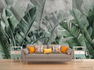 Фотообои Зеленые тропические листья на фоне бетона. - 1