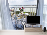 Фотообои вид на море с белого балкона - 2